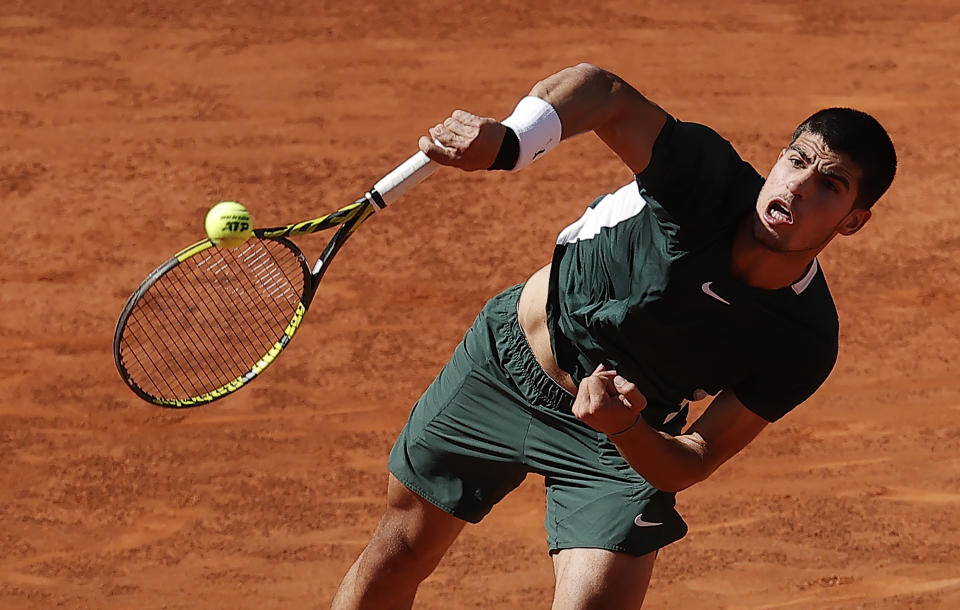 Seen here, Spain's Carlos Alcaraz in action against Novak Djokovic during their Madrid Open semi-final. 