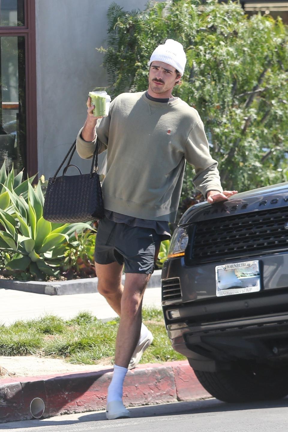 Jacob Elordi in Los Angeles, carrying a Bottega Veneta Andiamo bag.