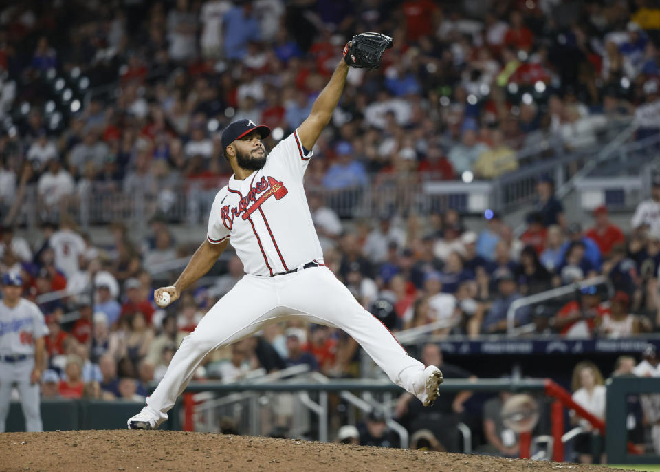 Atlanta Braves relief pitcher Kenley Jansen throws to a Los Angeles Dodgers batter during the ninth inning of a baseball game Saturday, June 25, 2022, in Atlanta. (AP Photo/Bob Andres)