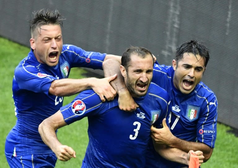 Italy's defender Giorgio Chiellini (C) celebrates a goal during the Euro 2016 round of 16 football match between Italy and Spain at the Stade de France stadium in Saint-Denis, near Paris, on June 27, 2016