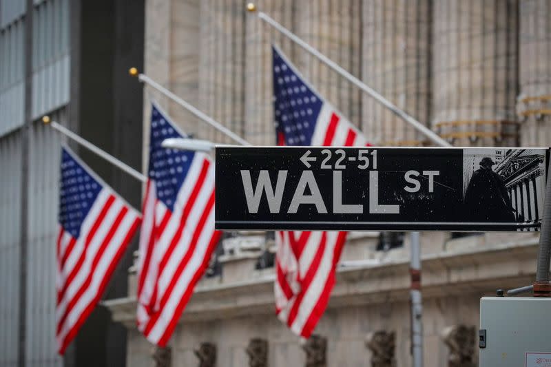 The Wall St. sign is seen outside the NYSE in New York