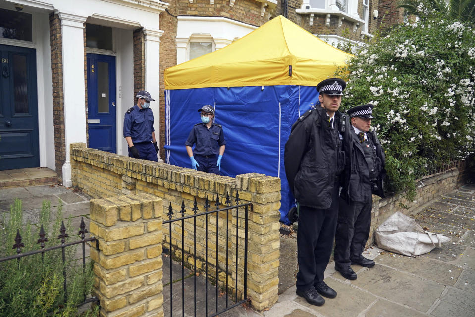 Police erect a tent outside a house in north London, thought to be in relation to the death of Conservative MP Sir David Amess, Sunday, Oct. 17, 2021. Leaders from across Britain's political spectrum have come together to pay tribute to a long-serving British lawmaker who was stabbed to death in what police have described as a terrorist attack. (Dominic Lipinski/PA via AP)