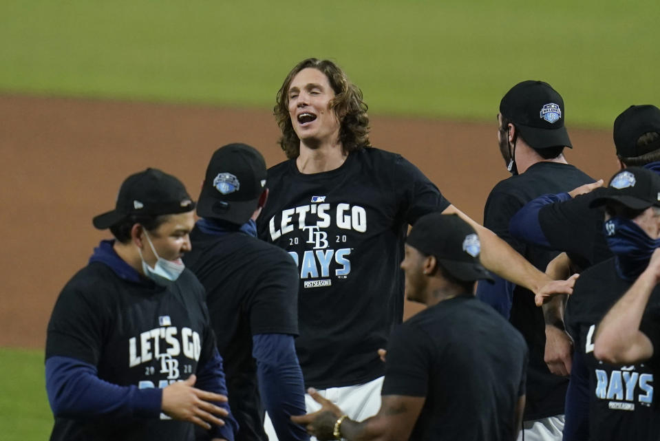Tampa Bay Rays starting pitcher Tyler Glasnow celebrates after Game 5 of the baseball team's AL Division Series against the New York Yankees, Friday, Oct. 9, 2020, in San Diego. Tampa Bay won 2-1 to advance to the AL Championship Series. (AP Photo/Gregory Bull)