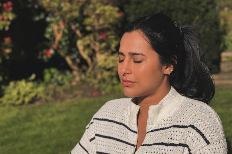 Sair Khan seen meditating outdoors