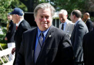 FILE PHOTO: White House Chief Strategist Steven Bannon departs the Rose Garden after U.S. President Donald Trump announced his decision to withdraw from the Paris Climate Agreement, at the White House in Washington, U.S., June 1, 2017. REUTERS/Joshua Roberts/File Photo