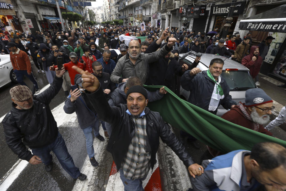 Algerians demonstrate in Algiers to mark the second anniversary of the Hirak movement, Monday Feb. 22, 2021. February 22 marks the second anniversary of Hirak, the popular movement that led to the fall of Algerian President Abdelaziz Bouteflika. (AP Photo/Anis Belghoul)