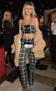 <p>Model Lottie Moss rocked up to the London club in a plaid co-ord and shearling coat. It also proved the perfect opportunity for the 20-year-old to debut a fringe. <em>[Photo: Getty]</em> </p>