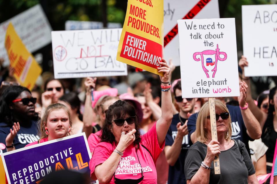 Abortion rights activists rally during a Bans Off Our Bodies protest at U-M's Diag in Ann Arbor on Saturday, May 14, 2022.