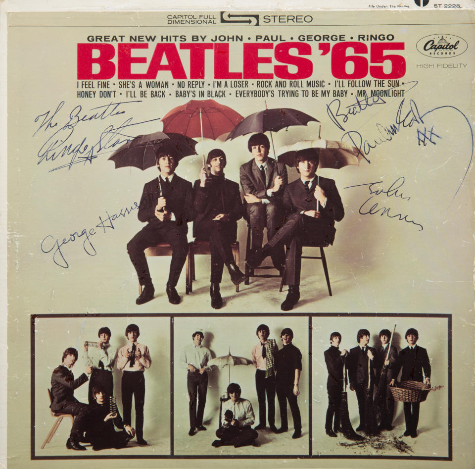 This undated photo provided by Julien's Auctions shows a “Beatles ’65” album signed by all four members of the band. It could bring up to $300,000 on May 17, 2014 during a rock memorabilia sale by Julien’s Auctions at the Hard Rock Cafe in New York. (AP Photo/Julien's Auctions)