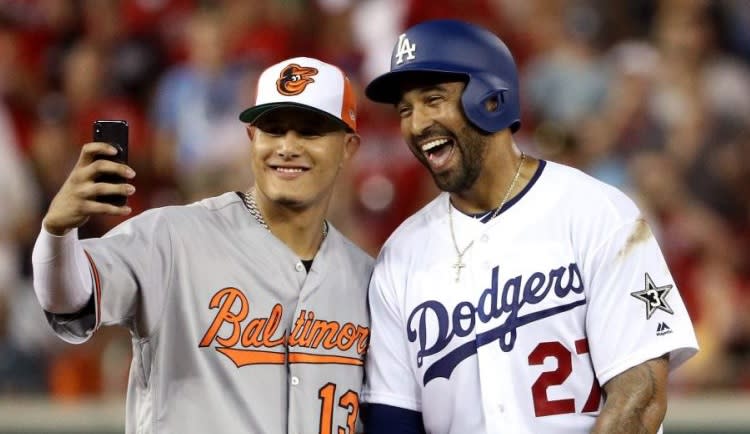 Manny Machado poses with new Dodgers teammate Matt Kemp during the All-Star Game. (AP)