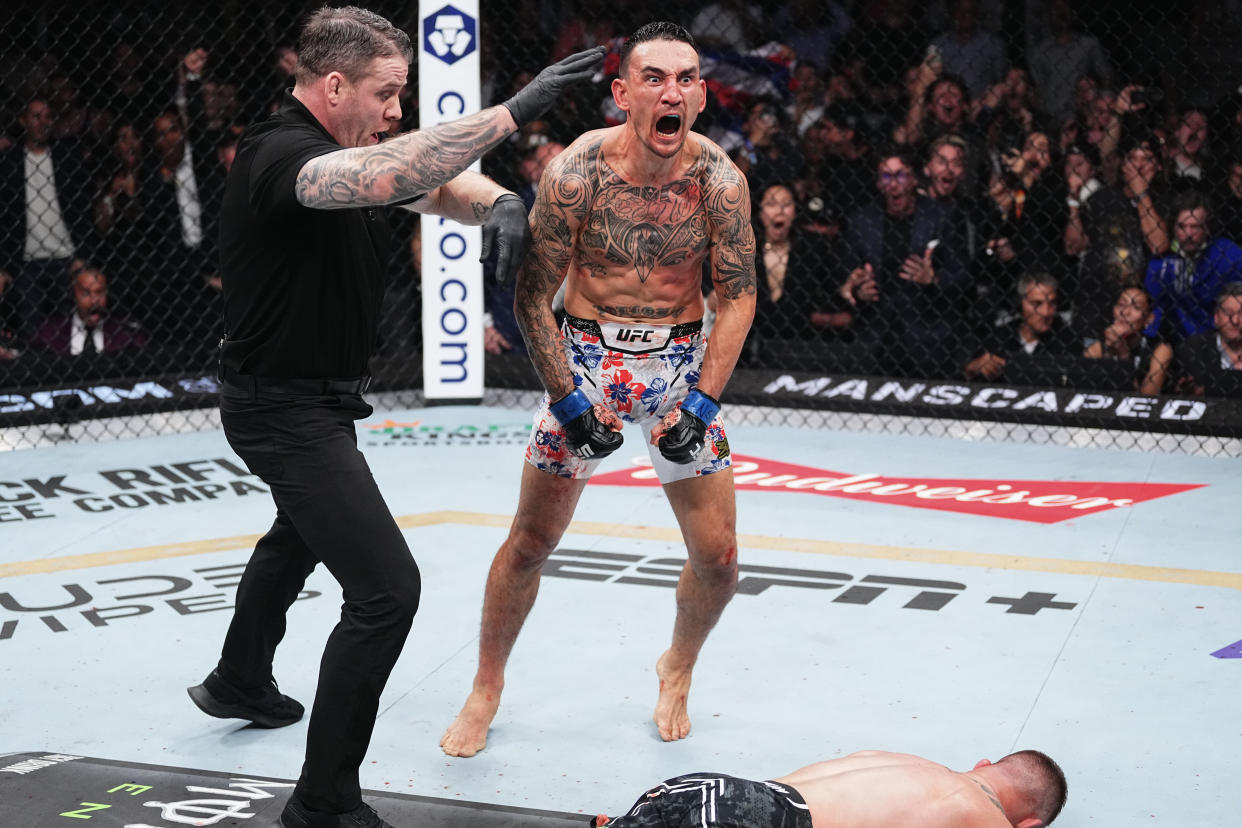LAS VEGAS, NEVADA - APRIL 13: Max Holloway reacts to the knockout of Justin Gaethje in the BMF championship fight during the UFC 300 event at T-Mobile Arena on April 13, 2024 in Las Vegas, Nevada.  (Photo by Jeff Bottari/Zuffa LLC via Getty Images)