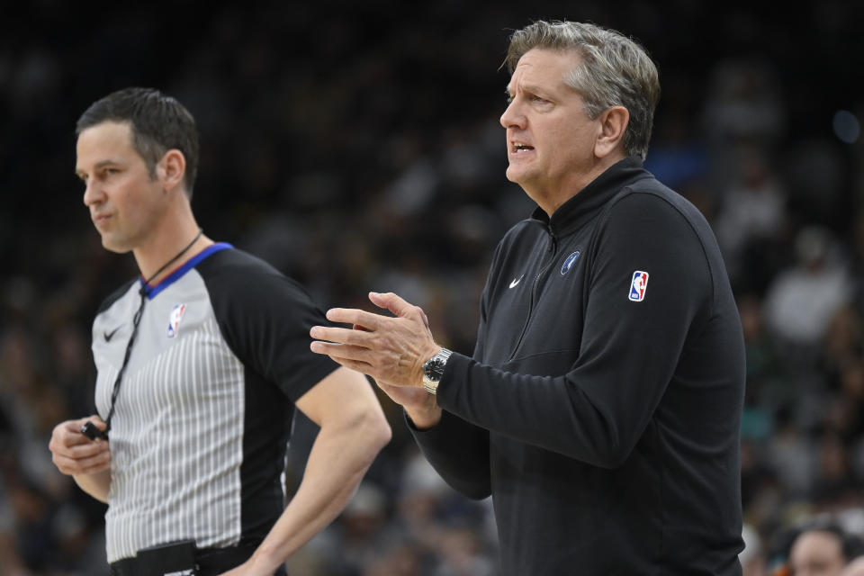 Minnesota Timberwolves head coach Chris Finch, right, yells to his players during the first half of an NBA basketball game against the San Antonio Spurs, Saturday, Jan. 27, 2024, in San Antonio. (AP Photo/Darren Abate)