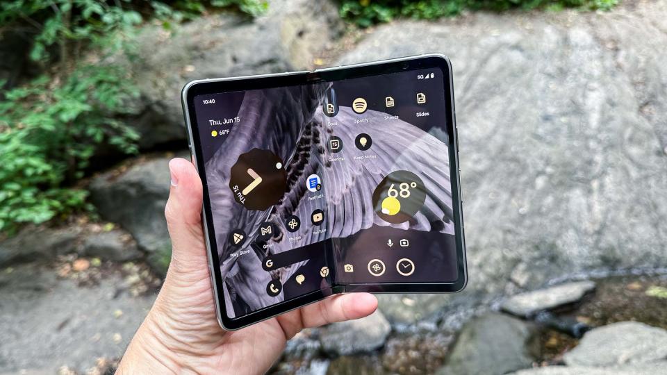 Google Pixel Fold shown in hand