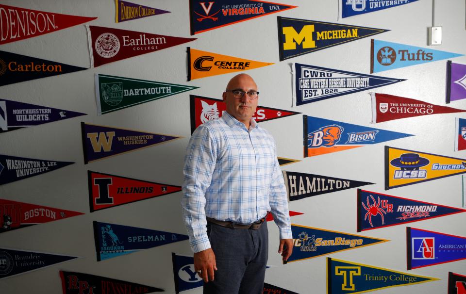 Beau Baker is the post-secondary counselor and founder of the Ivy+ Academy at Fern Creek High School. The pennants on his office represent the colleges and universities his students matriculated to. Aug. 15, 2023