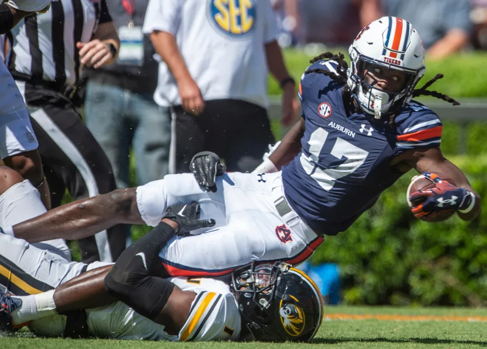 Auburn Tigers wide receiver Camden Brown (17) extends for extra yards after catching the ball as Auburn Tigers take on Missouri Tigers at Jordan-Hare Stadium in Auburn, Ala., on Saturday, Sept. 24, 2022.