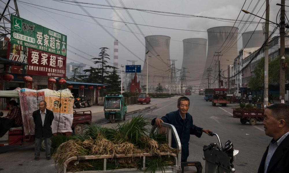 Vendors near a state-owned coal-fired power plant in China.