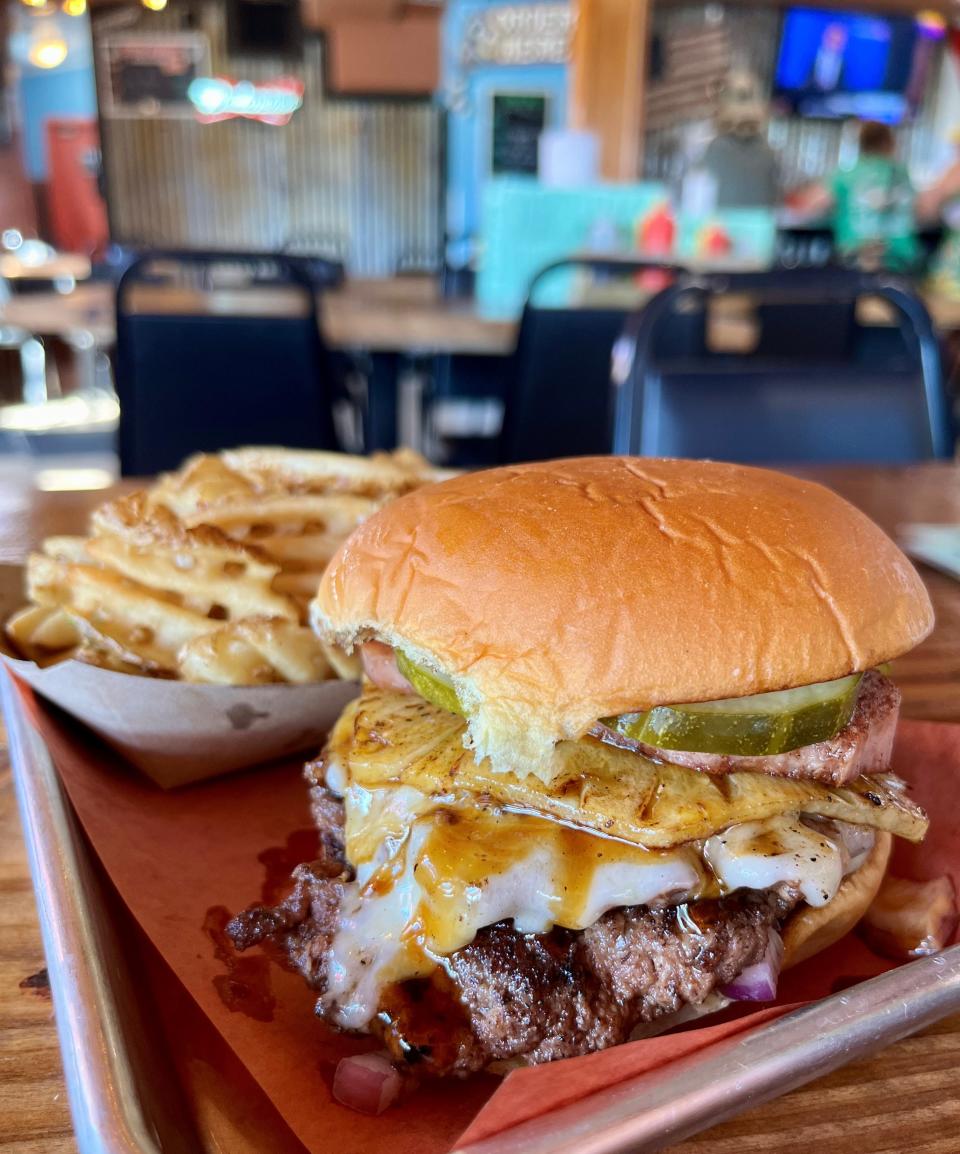 The Hawaiian burger — complete with grilled pineapple, teriyaki and Spam — was a recent special at Street Eatz & Ale in Bokeelia.