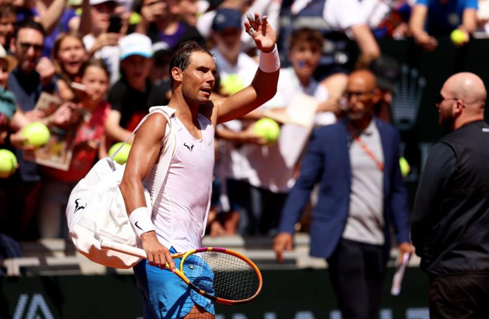 Nadal waves to the crowd during a practice session at Roland Garros  (Getty Images)