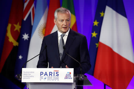 FILE PHOTO: French Economy and Finance Minister Bruno Le Maire delivers a speech during a high-level forum on debt at the Finance ministry in Paris, France, May 7, 2019. REUTERS/Benoit Tessier/File Photo