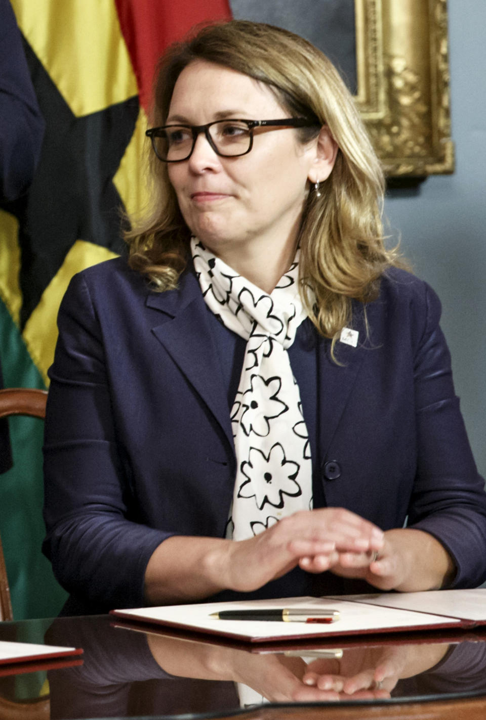 FILE - Dana Hyde, CEO of the Millennium Challenge Corporation, participates in the Ghana Compact signing ceremony during the US Africa Leaders Summit at the State Department in Washington on Aug. 5, 2014. Investigators said Friday, March 24, 2023, that Hyde, a passenger on a business jet, was fatally injured in early March when the aircraft violently bucked up and down after pilots disconnected a system used to stabilize the plane. (AP Photo/J. Scott Applewhite, File)