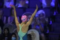 Regan Smith reacts after winning the women's 100 backstroke during wave 2 of the U.S. Olympic Swim Trials on Tuesday, June 15, 2021, in Omaha, Neb. (AP Photo/Charlie Neibergall)