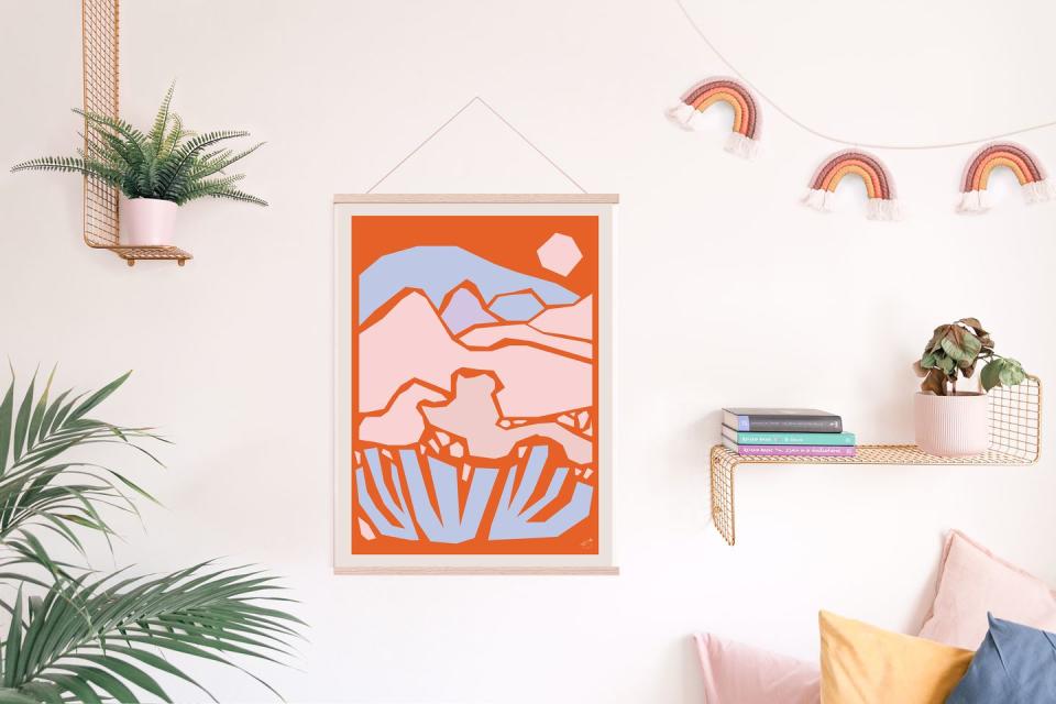 orange and blue print on wall