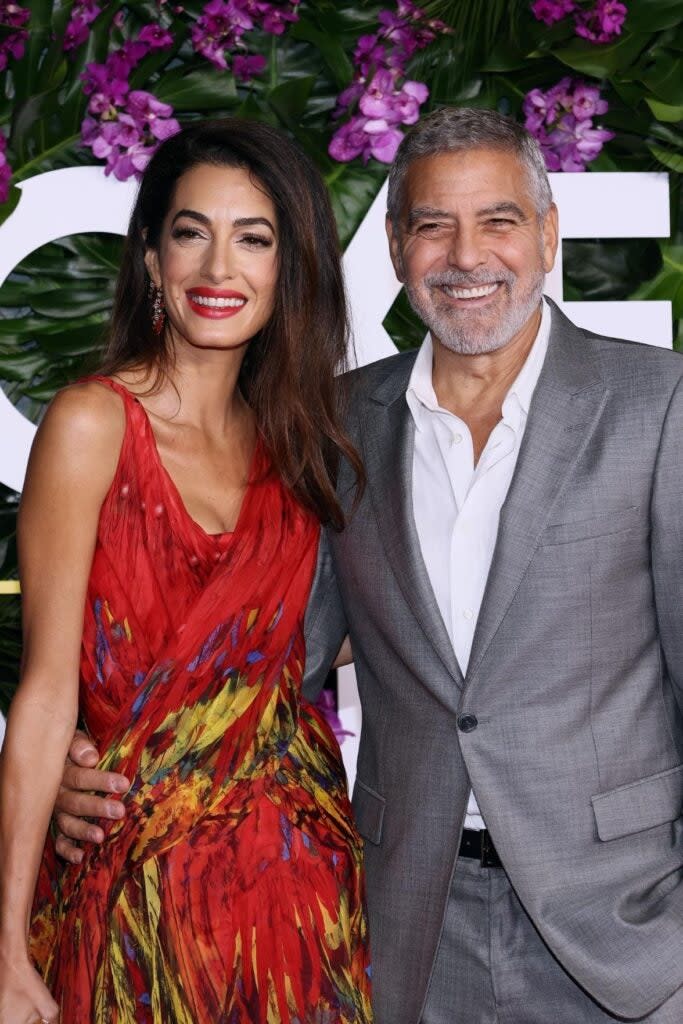 Amal and George Clooney attend the premiere of Universal Pictures’ “Ticket to Paradise” at Regency Village Theater on October 17, 2022 in Los Angeles, California.