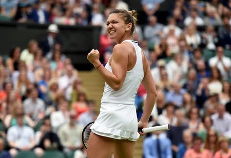 Britain Tennis - Wimbledon - All England Lawn Tennis & Croquet Club, Wimbledon, England - 2/7/16 Romania's Simona Halep celebrates winning the first set in her match against Holland's Kiki Bertens REUTERS/Toby Melville