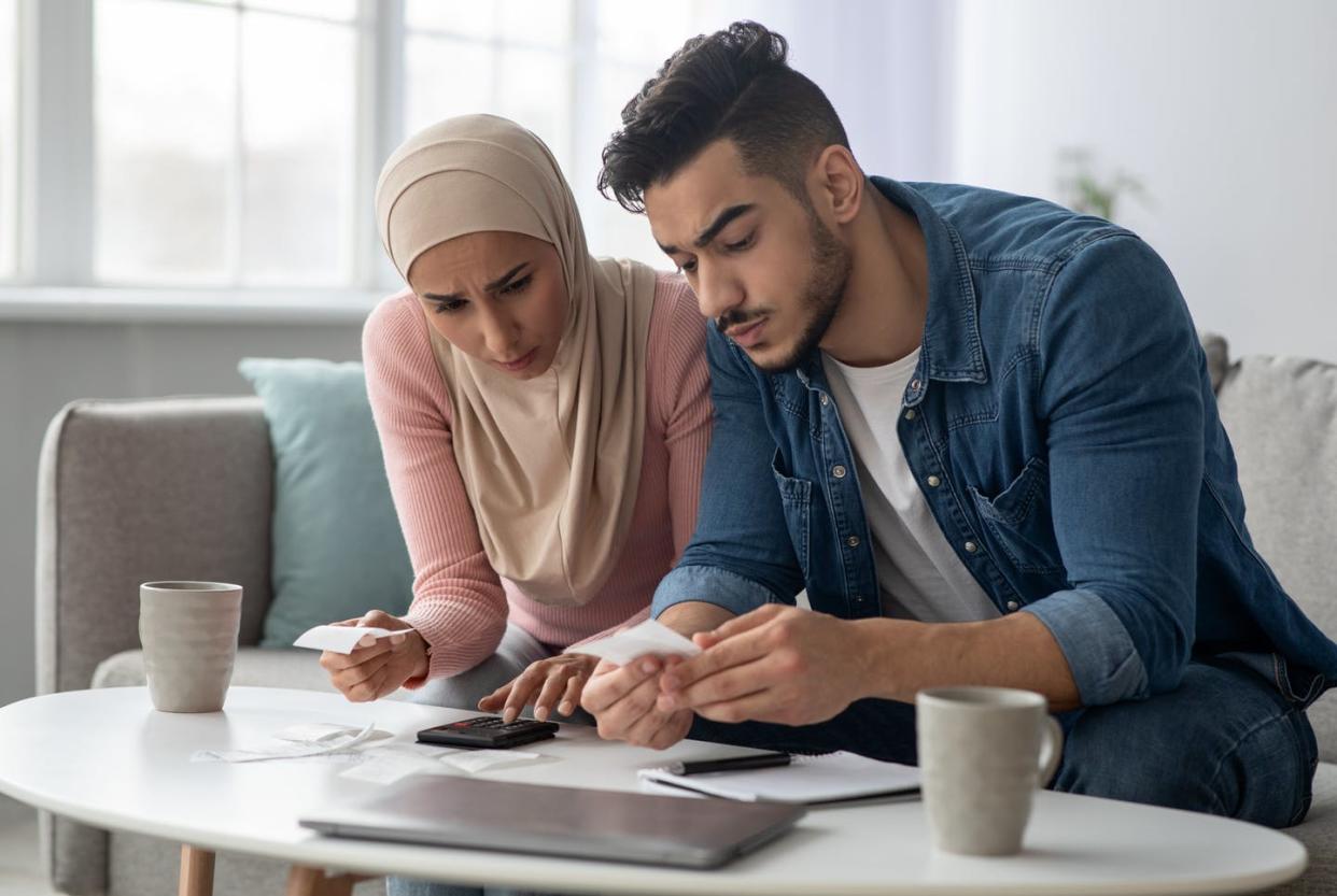 <span class="caption">Even college-educated adults can still struggle with numbers. </span> <span class="attribution"><a class="link " href="https://www.gettyimages.com/detail/photo/confusded-lady-in-hijab-and-her-upset-husband-with-royalty-free-image/1313791943?adppopup=true" rel="nofollow noopener" target="_blank" data-ylk="slk:Prostock-Studio/iStock via Getty Images;elm:context_link;itc:0;sec:content-canvas">Prostock-Studio/iStock via Getty Images</a></span>