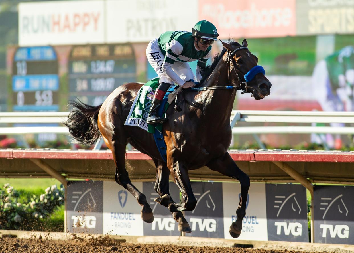 In this image provided by Benoit Photo, Flightline, with Flavien Prat aboard, wins the Grade I, $1,000,000 Pacific Classic horse race Saturday, Sept. 3, 2022, at Del Mar Thoroughbred Club in Del Mar, Calif. (Benoit Photo via AP)