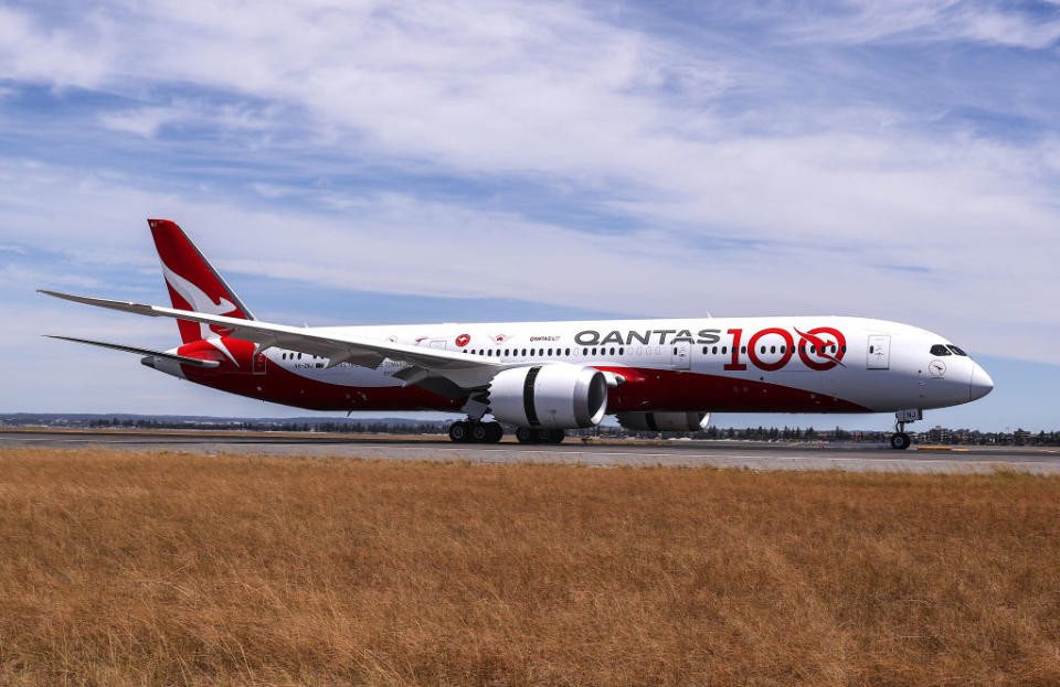 SYDNEY, AUSTRALIA - NOVEMBER 15: Qantas flight QF7879 lands at Sydney Airport on November 15, 2019 in Sydney, Australia. The 19 hour  19 minute flight was restricted to 50 people, including 10 crew, to increase aircraft range, and included medical scientists and health experts on board to conduct studies in the cockpit and the cabin to help determine strategies to promote long haul inflight health and wellbeing on ultra-long haul flights. It comes as the national carrier continues to work towards the final frontier of global aviation by launching non-stop commercial flights between the US and the UK to the east coast of Australia in an ambitious project dubbed "Project Sunrise". 