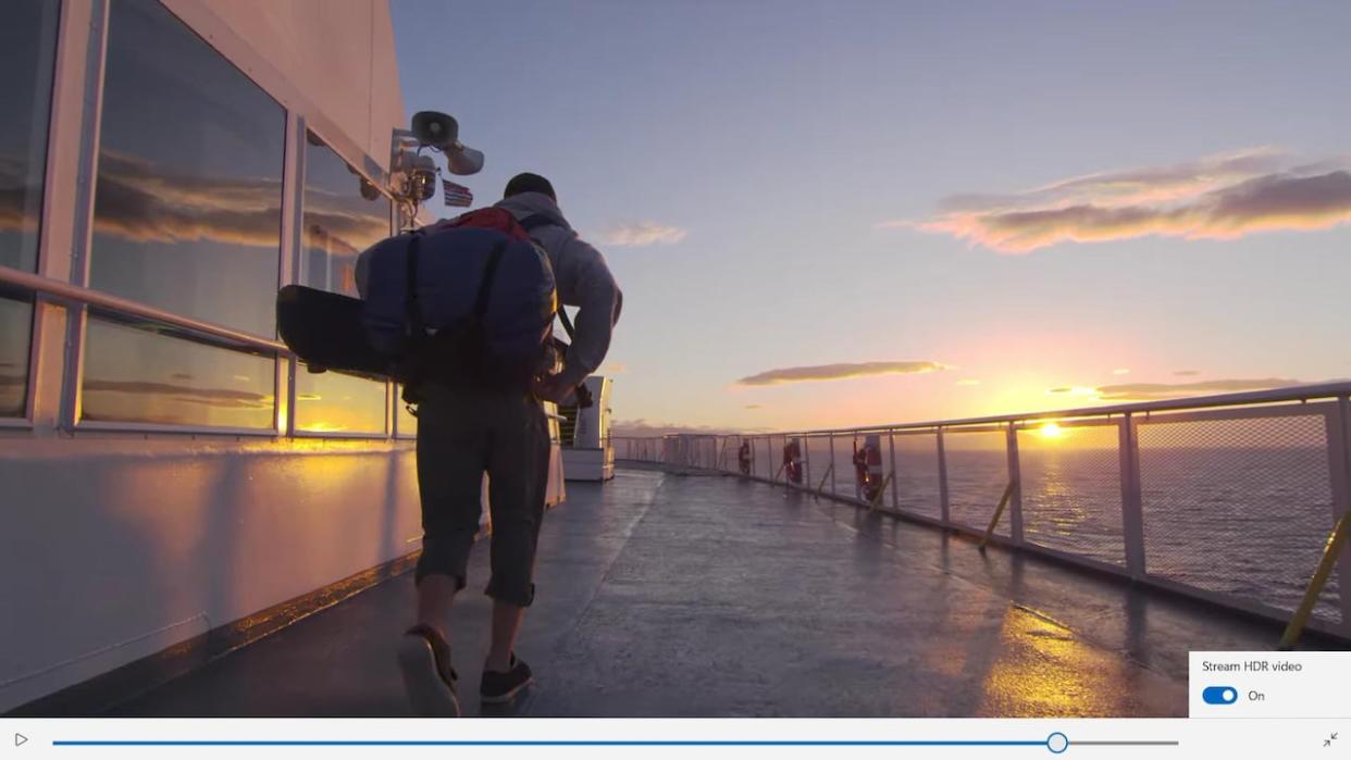 In this screengrab from a Windows computer, Miguel Barbosa is pictured walking on an early morning ferry to Nanaimo, B.C.  (Microsoft Windows  - image credit)