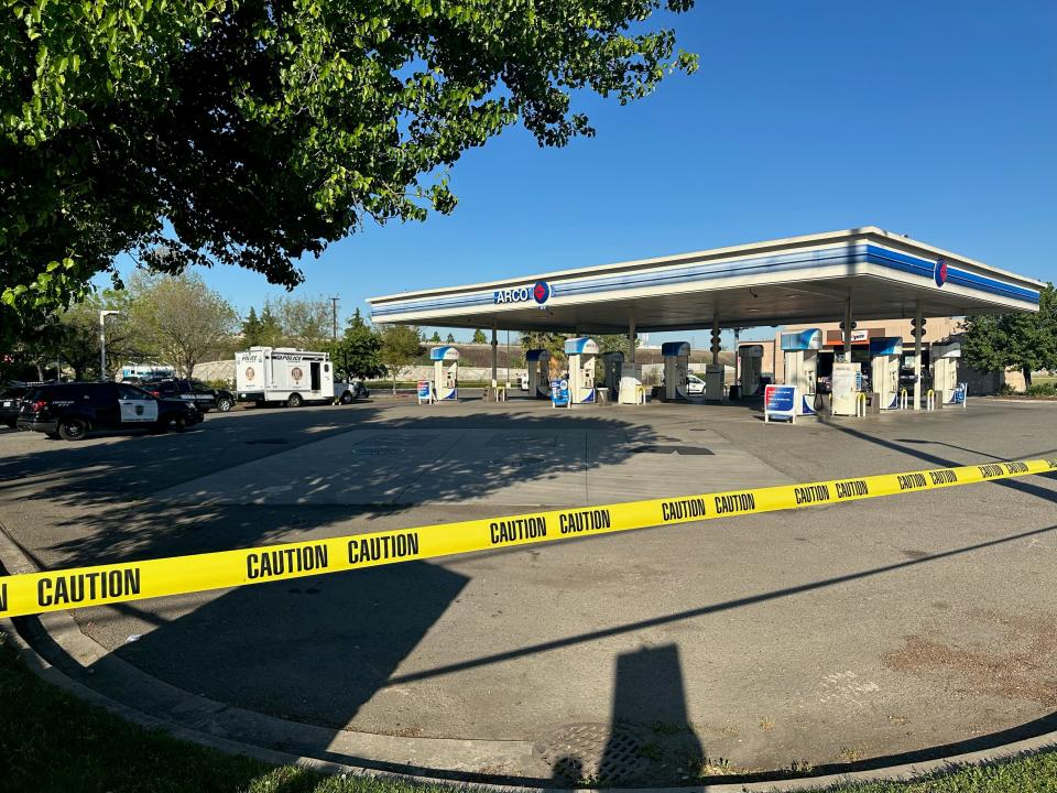 Police officers investigate a shooting on the 4800 block of E. 99 Frontage Road in Stockton on Thursday, April 18, 2024.