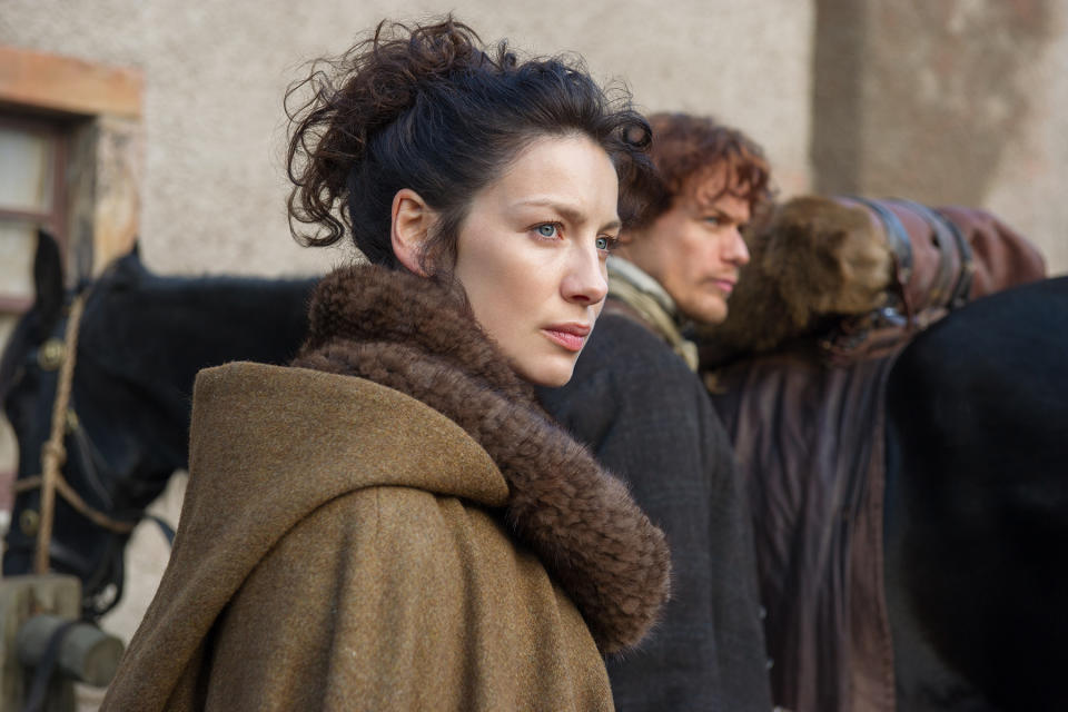 (L-R): Caitriona Balfe as Claire Fraser and Sam Heughan as Jamie Fraser in <em>Outlander</em><span class="copyright">Neil Davidson—Sony Pictures Television</span>
