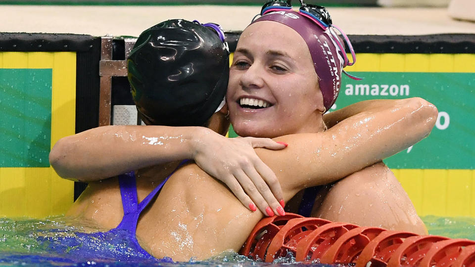 Ariarne Titmus, pictured here hugging Emma McKeon after the women's 200m freestyle final.