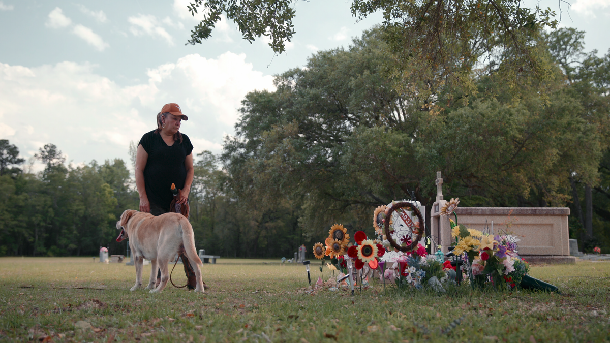 Bubba the dog and Blanca visit Maggie’s grave (Netflix)