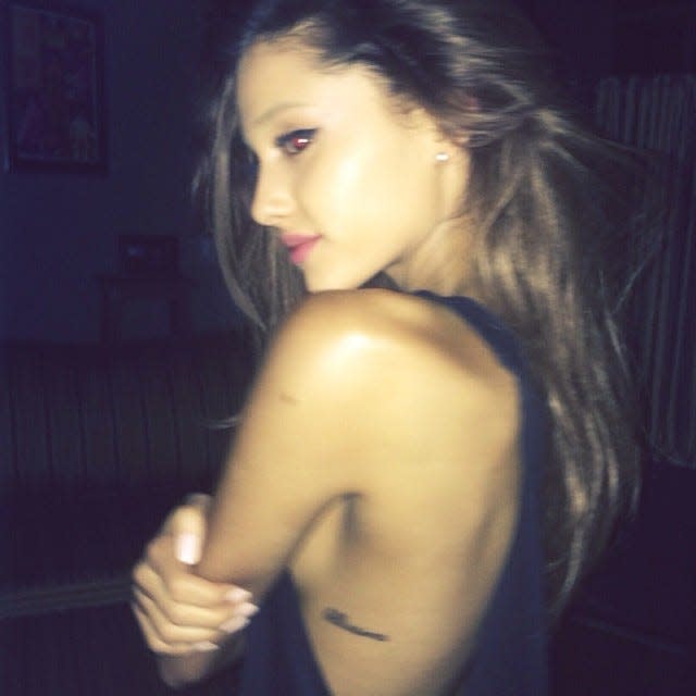 ariana grande tattoo ribcage