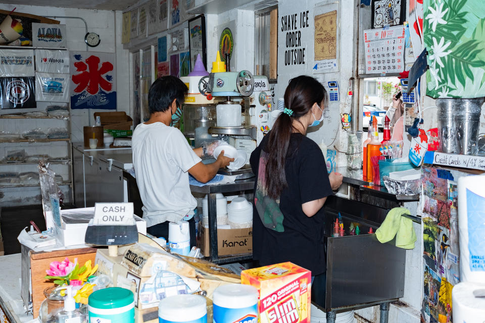 Inside Waiola Shave Ice, where employees receive orders though a window<span class="copyright">Courtesy Bennet Tadashi Adamson</span>
