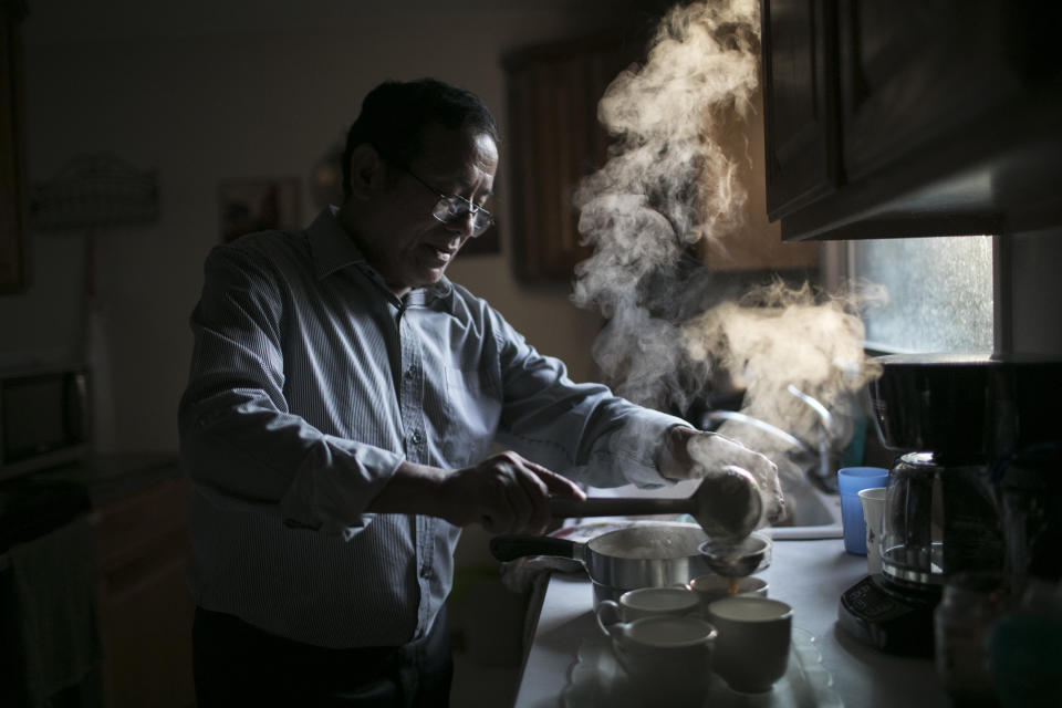 Dhan Tumbapoo, Amber Subba's father, makes tea at home. He lives with his wife, son, his son's wife and their two children.