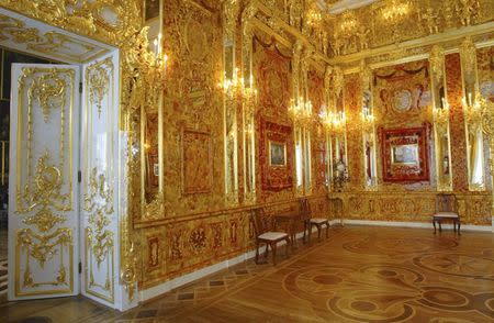 File photo of the the Amber Room just before its opening after a complete reconstruction in the Catherine Palace in St. Petersburg May 31, 2003. REUTERS/Alexander Zemlianchenko