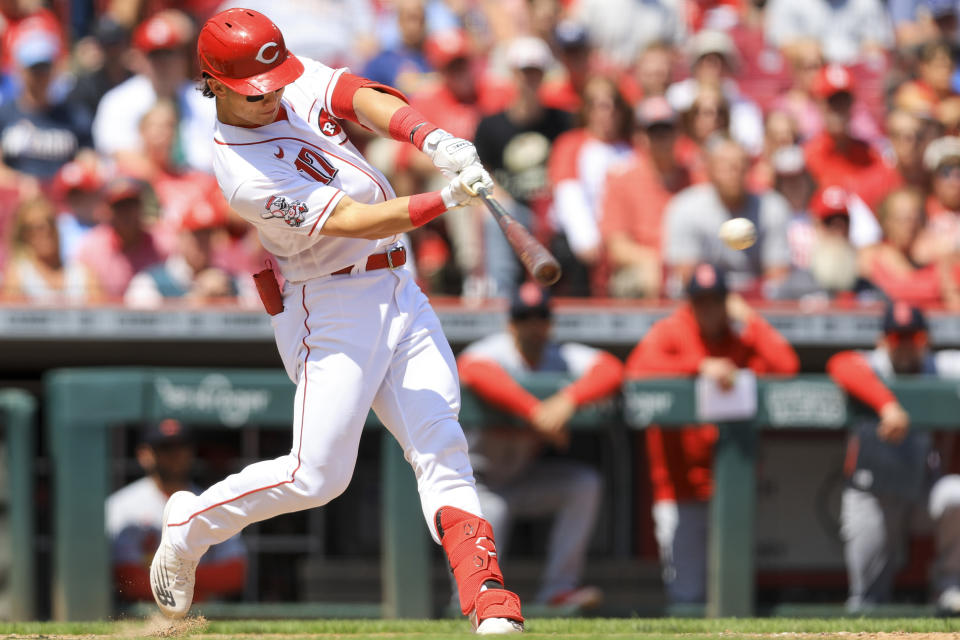 Cincinnati Reds' Stuart Fairchild hits an RBI-single during the ninth inning of a baseball game against the St. Louis Cardinals in Cincinnati, Thursday, May 25, 2023. (AP Photo/Aaron Doster)