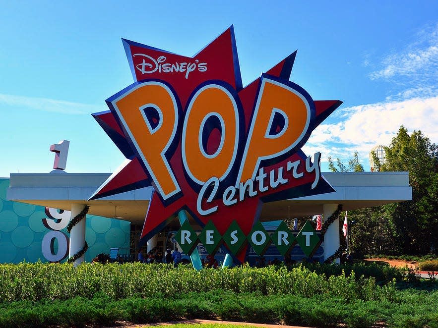 shot of the main entrance sign at pop century resort at disney world