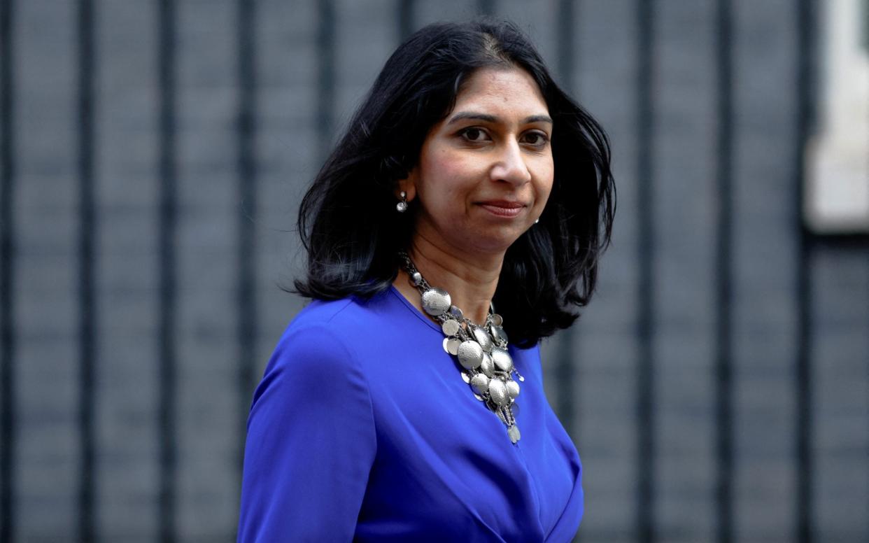 Suella Braverman, the Attorney General, walks outside 10 Downing Street on March 23 this year - John Sibley/Reuters