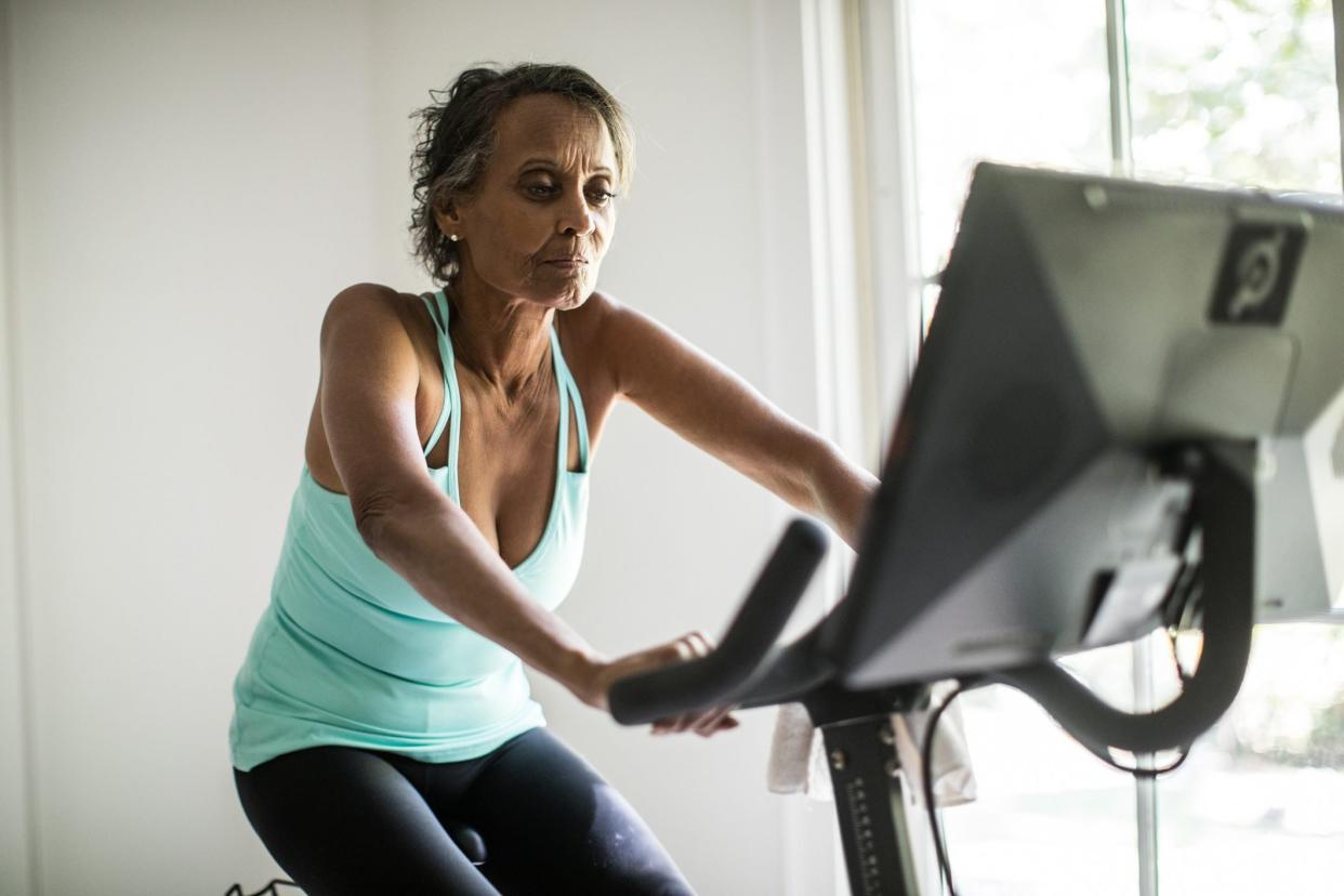 mature woman on exercise bike
