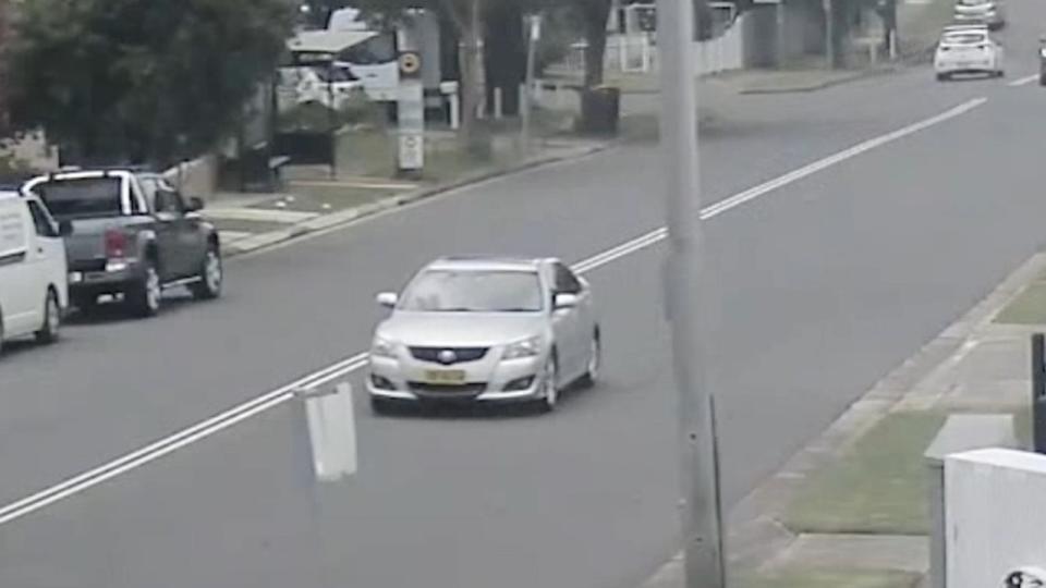 After appearing to set the Mini ablaze, two men fled in a grey Toyota Aurion. Picture: NSW Police