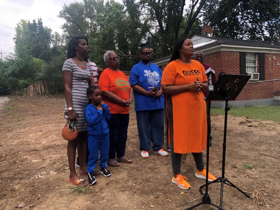 Shelby County Commissioner Britney Thornton, surrounded by residents of District 10, announces the creation of a blight remediation campaign called 'Shine Blight!' Friday September 9, 2022.
