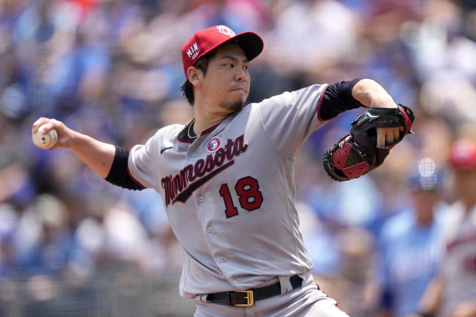 Minnesota Twins starting pitcher Kenta Maeda throws during the first inning of a baseball game against the Kansas City Royals Sunday, July 4, 2021, in Kansas City, Mo. (AP Photo/Charlie Riedel)