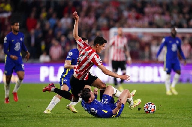 Christian Norgaard (centre) in action against Chelsea