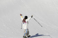 Sweden's Henrik Harlaut gestures to the crowd after crashing during the men's ski slopestyle qualifying at the Rosa Khutor Extreme Park, at the 2014 Winter Olympics, Thursday, Feb. 13, 2014, in Krasnaya Polyana, Russia. (AP Photo/Andy Wong)