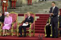 Tony Blair speaks while the Queen and Prince Philip listen on in Westminster Hall. The Queen had just opened the 46th Commonwealth Parliamentary Conference. (JOHN STILLWELL/AFP via Getty Images)